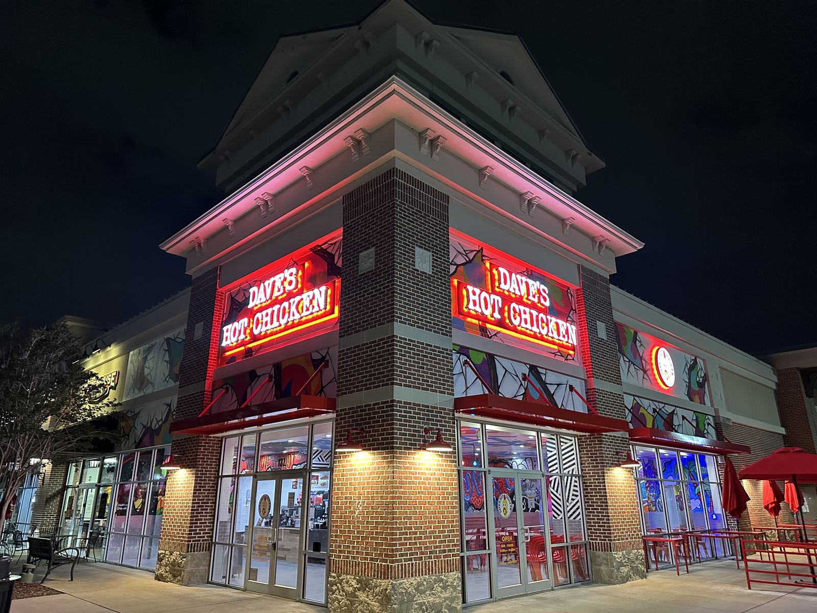 Finished Dave's Hot Chicken storefront exterior at night
