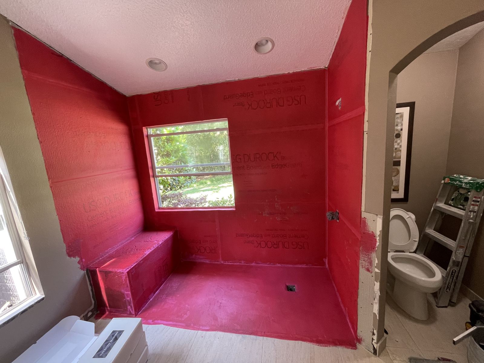 Shower stripped to waterproof membrane before tile installation