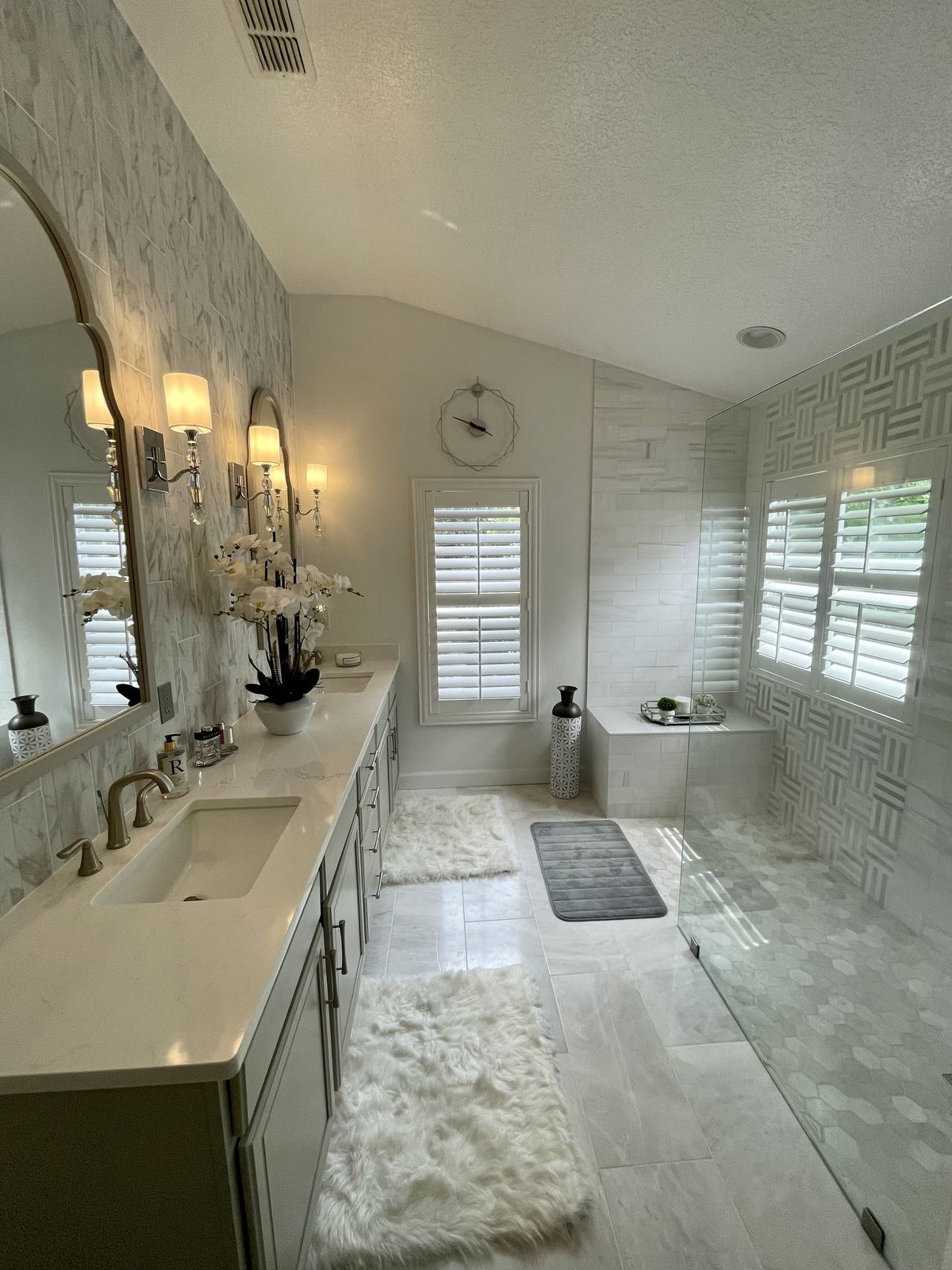 Finished bathroom with view from vanity toward walk-in shower